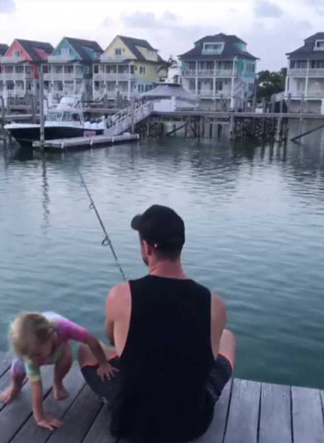 459DD0F600000578-5010713-Chilling_out_In_another_shot_Chris_enjoys_fishing_with_their_kid-a-91_1508821836523