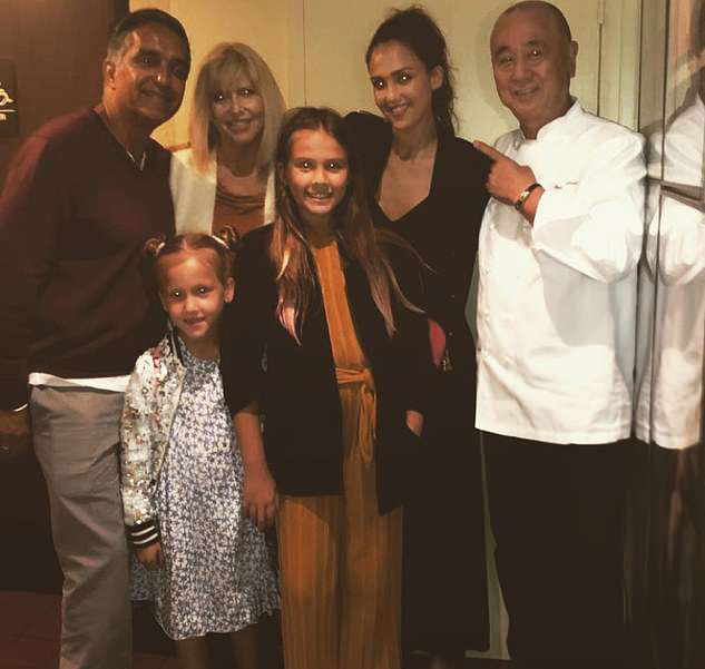 4901376-6258351-Group_hug_Jessica_was_joined_by_l_r_her_father_Mark_daughter_Hon-a-33_1539124251307